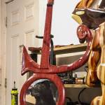 Pilkingtons dog, Bane, reflected in the mirror/guitar inspired by singer and songwriter Prince. (Photo by Luisa Loi)