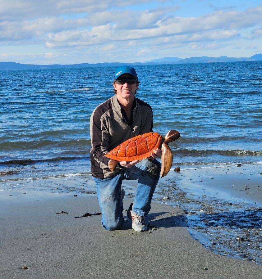 Chad Pilkington poses with a turtle he created. (Photo provided)