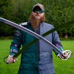 Jeremy Coleman of the Snohomish Dueling Society shows off his swords. (Photo by David Welton)