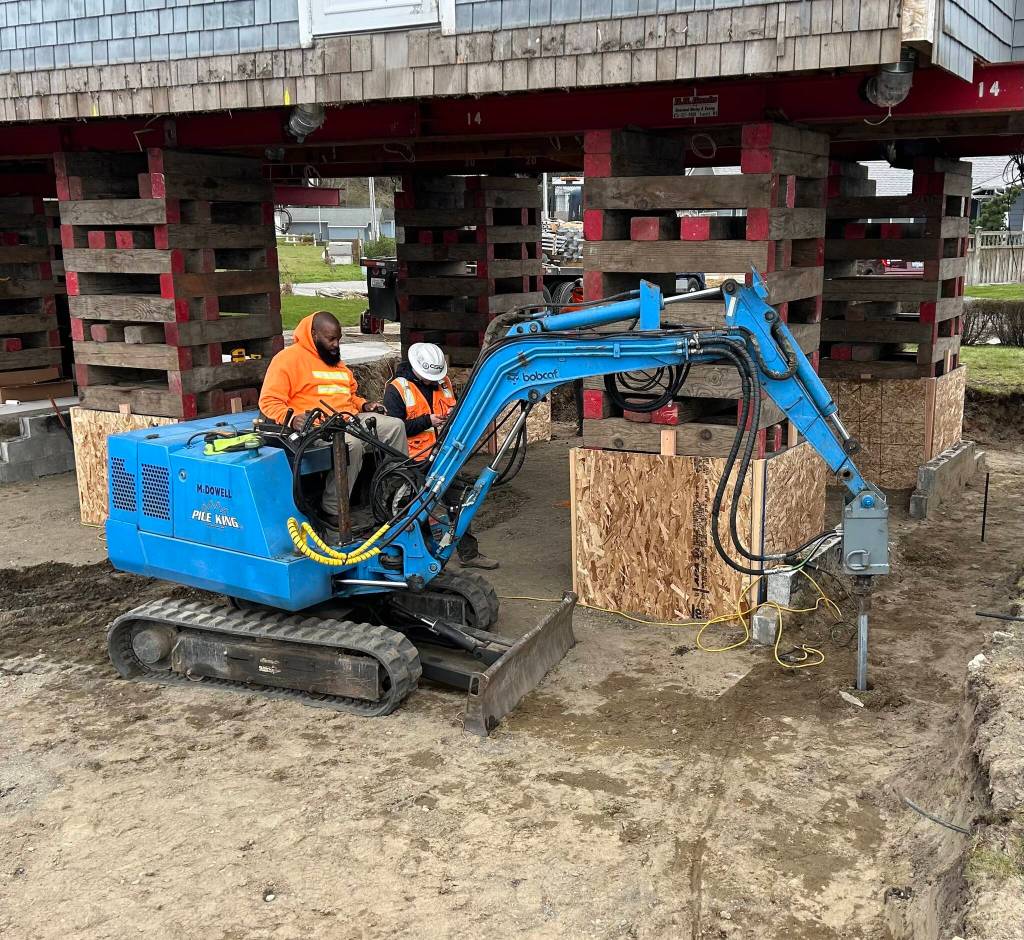 To combat liquefaction, Reddan Construction installed 22 helical anchors, drilled 45 feet into the earth, beneath the new foundation. (Photo courtesy of Reddan Construction)