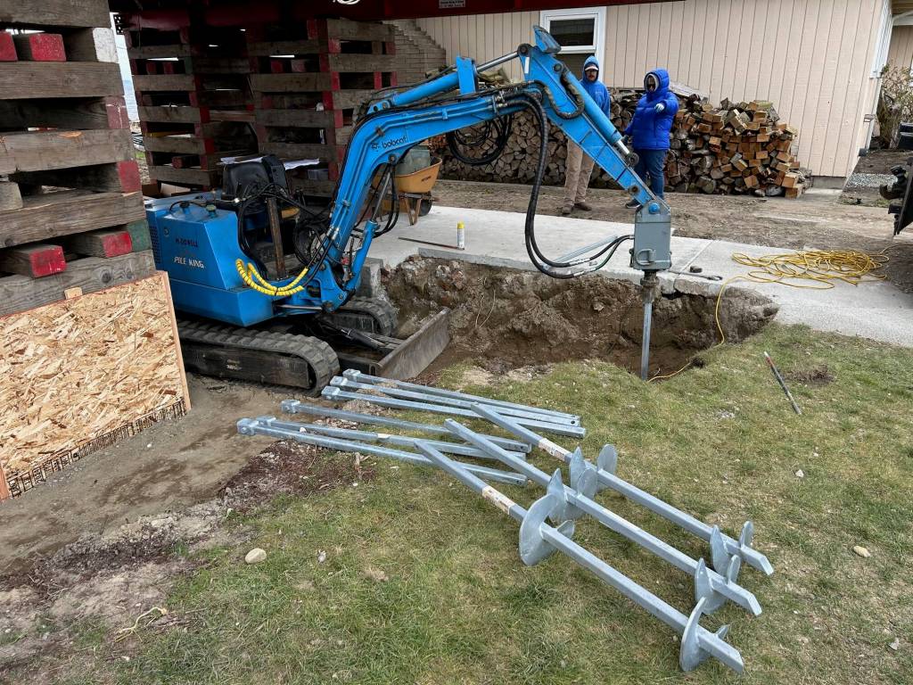 To combat liquefaction, Reddan Construction installed 22 helical anchors, drilled 45 feet into the earth, beneath the new foundation. (Photo courtesy of Reddan Construction)