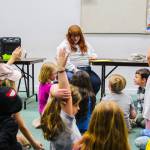 Photo by Luisa Loi
Acting Instructor Shelby Montoya and her students brainstorm pop-culture character names for the improv acting game Guests at a Party.