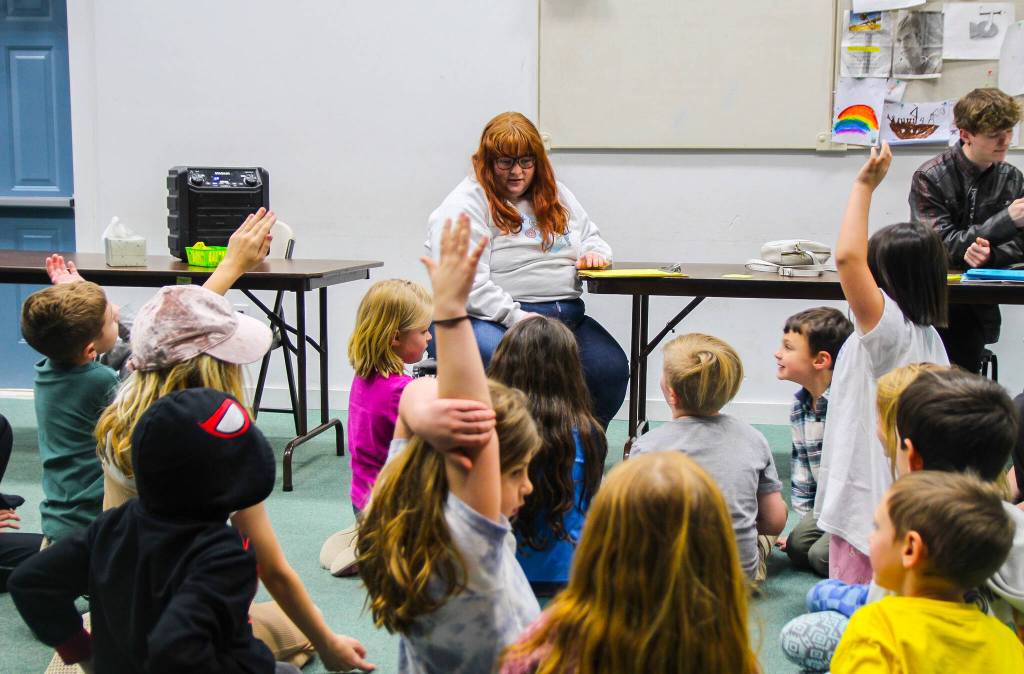 Photo by Luisa Loi
Acting Instructor Shelby Montoya and her students brainstorm pop-culture character names for the improv acting game Guests at a Party.