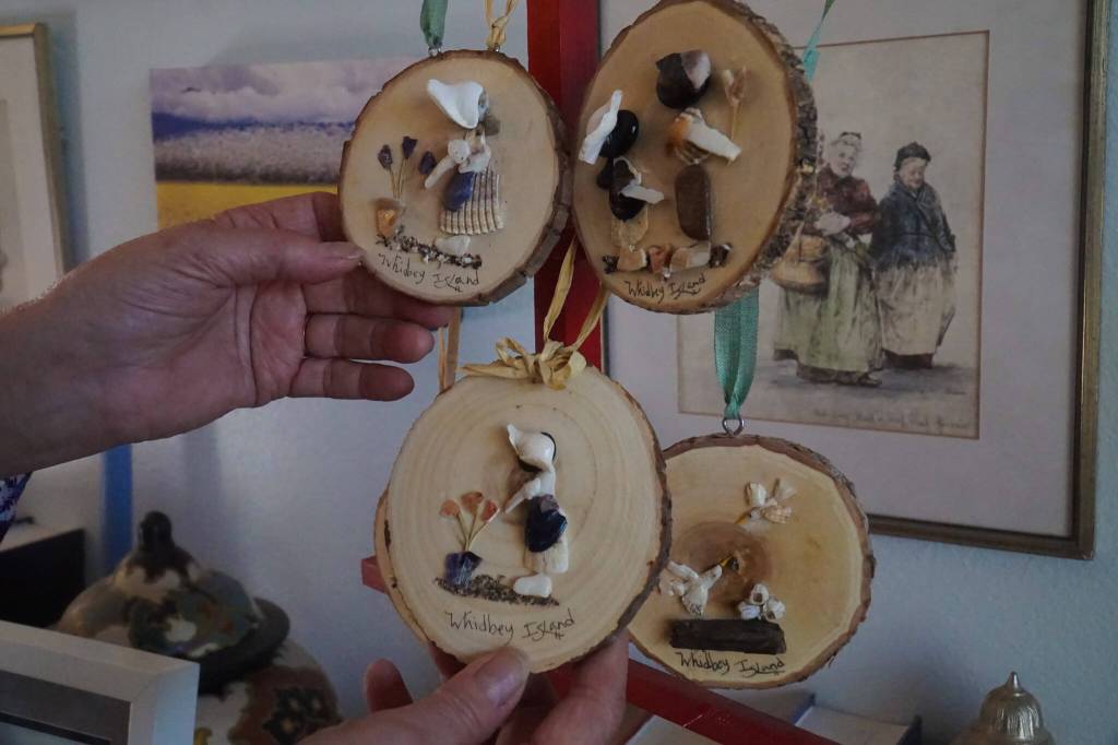 Photo by Sam Fletcher
Made entirely of shells, rocks, odds and ends from the beach, Hammers work portrays wholesome scenes of sisters playing, fishermen and families interacting with Whidbeys scenery.