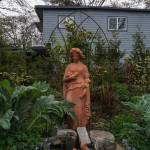 The Gillespies garden became an Italian style oasis, with cypress trees, a picket fence and arched gates. (Photo by Sam Fletcher)