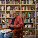 Photo by David Welton
Bob Markey reads from Barbarian Days: A Surfing Life by William Finnegan. Its one of many titles within his new bookstore, Mutiny Bay Books.