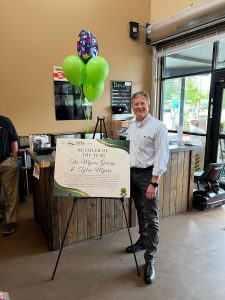 Photo provided by WFIA
Tyler Myers, president and CEO of the Myers Group, celebrates his selection as the WFIA 2023-24 Retailer of the Year. The award was presented at a surprise ceremony held May 13 at the Goose.