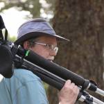 Steven Ellis carries his spotting scope through Ft. Ebey State Park. (Photo provided)