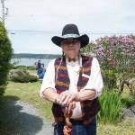 Photo by Sam Fletcher
Storyteller Lou LaBombard stands before the Island County Historical Museum on Saturday.