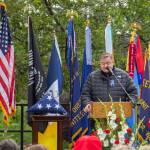 Oak Harbor Mayor Ronnie Wright welcomes the attendees to the Memorial Day Service of Remembrance at the Maple Leaf Cemetery on May 27. (Photo by Caitlyn Anderson)