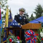 Capt. Eric Hanks, commanding officer of Naval Air Station Whidbey Island, speaks during of the Memorial Day Service. (Photo by Caitlyn Anderson)