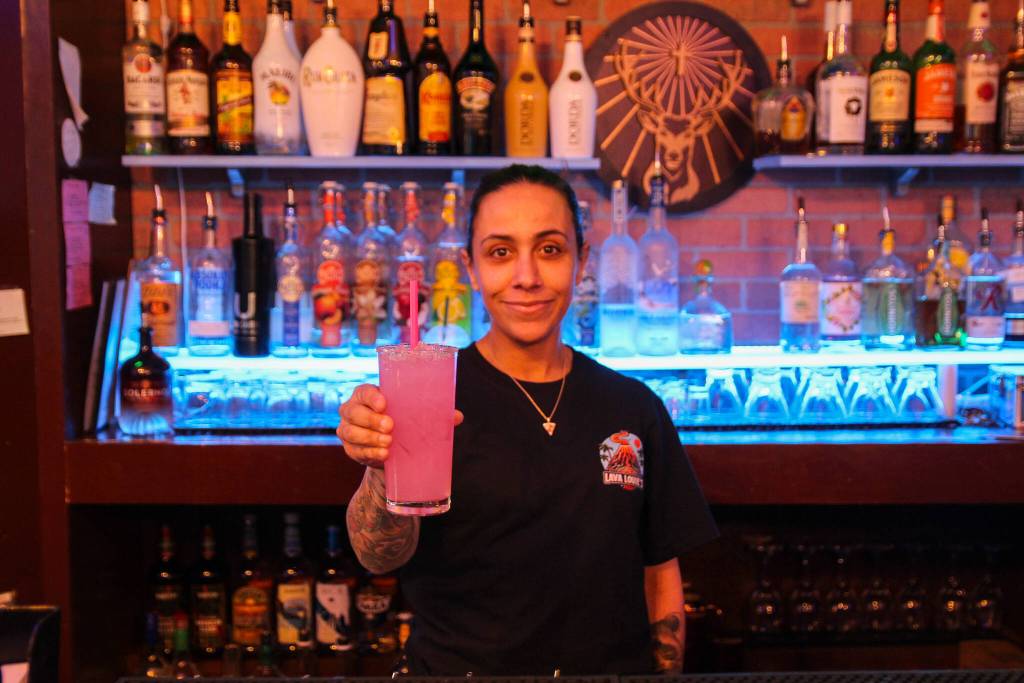 Photo by Luisa Loi
Manager Carla Rivera serves a Dragon Fruit Paloma.
