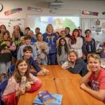 Photo by David Welton
Muncey stands with her classroom of students.