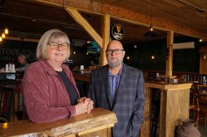 Photo by Sam Fletcher
Mercedes Fulwiler, left, and Jason Tritt, co-owners of Barringtons Irish Bar & Grill on Pioneer Way, pose before their grand opening.