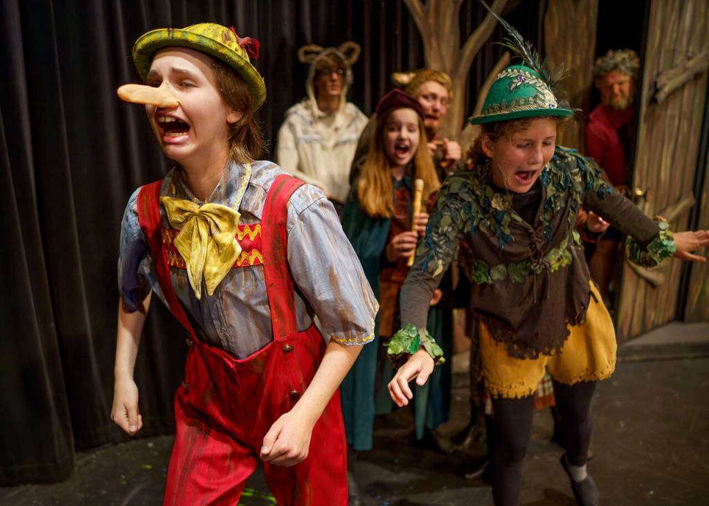 From left, Tevrin Murray, Callum Cassée, Leah Bixby, Aidan Martin and Layla Akhtar as fairytale creatures flee from director Michael Morgen, who is standing in for the fearsome ogre Shrek in this scene. (Photo by David Welton)