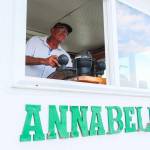 Dennis Redmon, who owns a captains license, drives his ferry house Annabelle. (Photo by Luisa Loi)