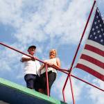 Kat and Dennis Redmon admire the view from the top floor of their ferry house. (Photo by Luisa Loi)