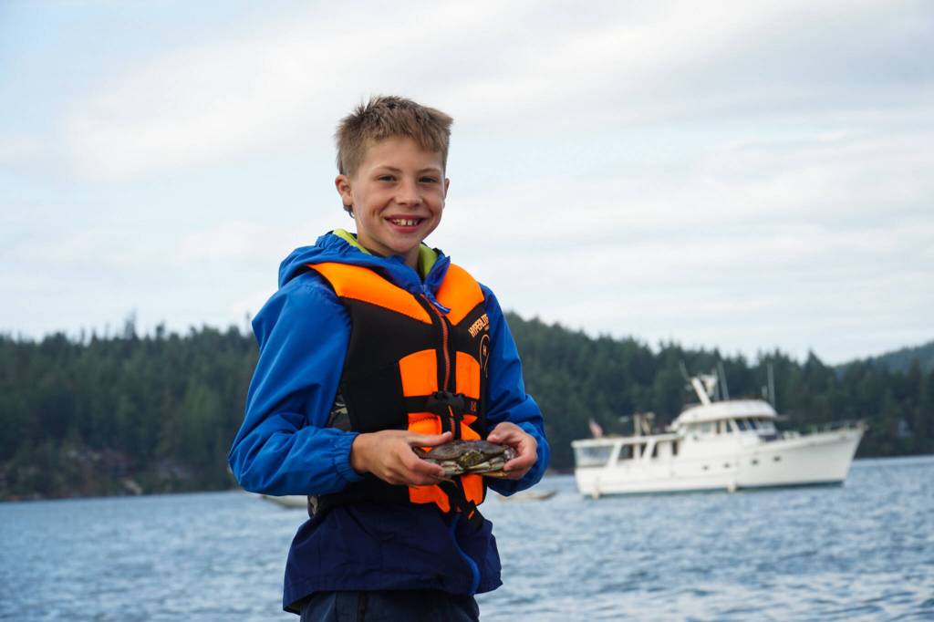 Photo by Sam Fletcher
Weston Stewart reveals his catch in Cornet Bay.