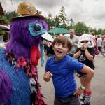 Liberace the robot turkey greets young fairgoers Thursday afternoon. (Photo by David Welton)