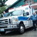 Photo by Sam Fletcher
Tom Cross, WhidbeyHealth paramedic, loads into an ambulance with his partner.