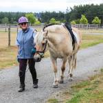 Long time horse rider Pat Lamont takes 28-year-old Merit to the stable where he resides. (Photo by Luisa Loi)