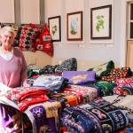 Fyfe stands by her sports-themed blankies. (Photo by Luisa Loi)