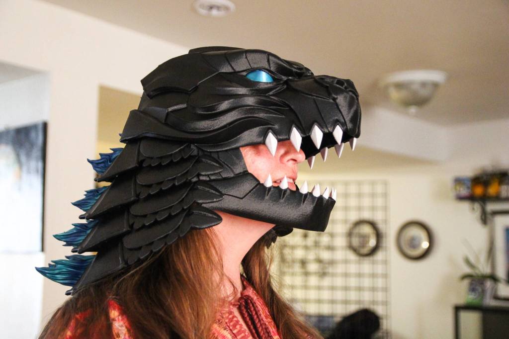 Heather Gray wears a Godzilla-inspired mask. (Photo by Luisa Loi)