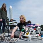 Photo by Sam Fletcher
Brenden Vandervort sits with a robot he built at Cornet Bay on Friday.