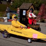 Peter Lawlor races in Ripe Old Banana during a previous Soup Box Derby. The racecar has been many things since then, including a red dragon. (Photo by David Welton)