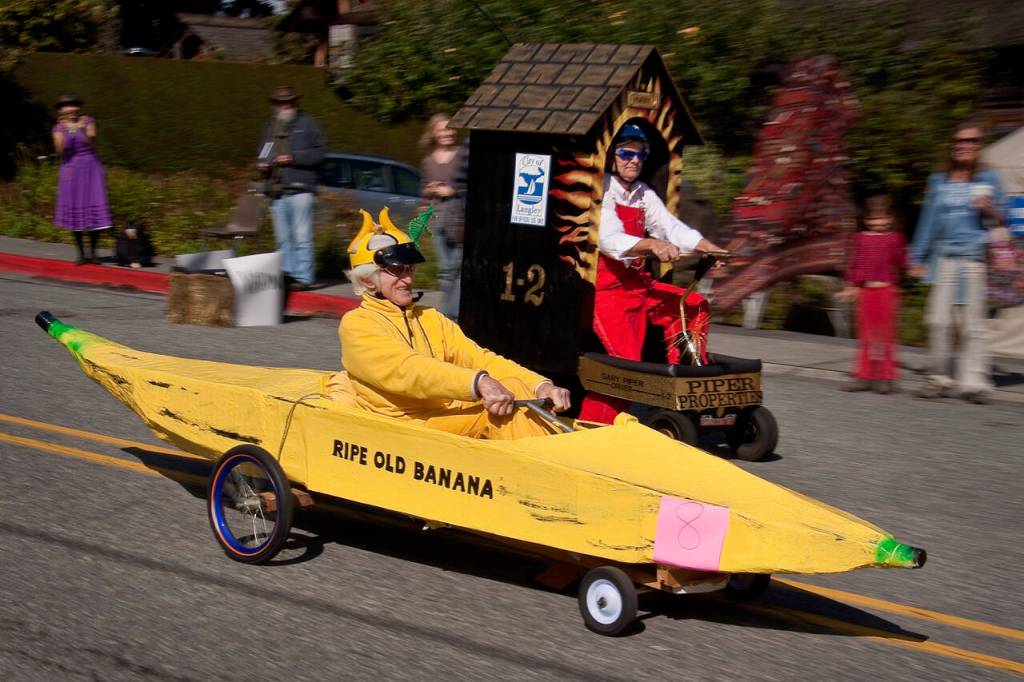 Peter Lawlor races in Ripe Old Banana during a previous Soup Box Derby. The racecar has been many things since then, including a red dragon. (Photo by David Welton)
