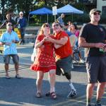 Photo by Luisa Loi
A couple happily dances to the sound of Locarno, a latin fusion band from Canada.