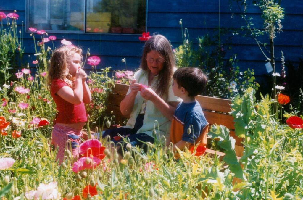 Founder Mully Mullally with some kids at the South Whidbey Childrens Center years ago. (Photo provided)
