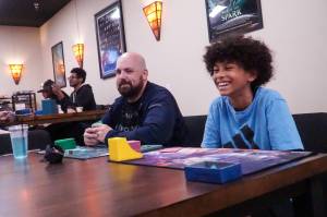 Photo by Sam Fletcher
James OBoyle, left and Christian Royal play Magic: the Gathering at the Book Rack in Oak Harbor for Friday Night Magic.