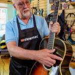Darrell Pope is the owner of the Village Luthier, a new instrument repair business in Langley. (Photo by David Welton)