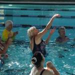 Carol Parbs hits the volleyball at the John Vanderzicht Memorial Pool Monday morning. (Photo by Sam Fletcher)