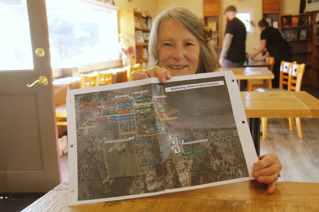 (Photo by Kira Erickson/South Whidbey Record)
Coyla Shepard, founder of WILL, holds up a map of the city of Langley.
