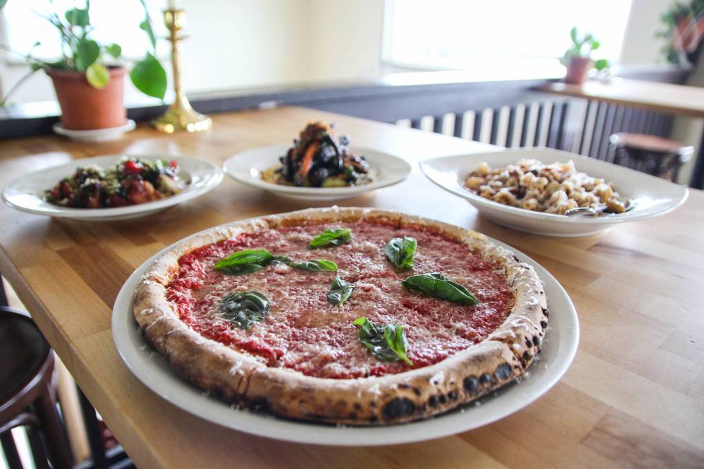 The Tomato Pie, made with red sauce, garlic oil, basil and aged reggiano. (Photo by Luisa Loi)