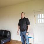 Reese Bliek, owner of Coppertop Construction, plans to restore the old Pioneer Way home and move it to the adjacent lot. (Photo by Sam Fletcher)