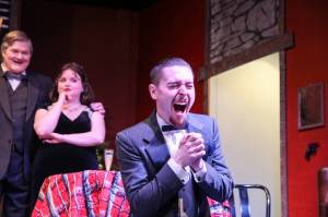 Photo by Luisa Loi
Simon Bright (Riley Stowell) learns he has become rich.