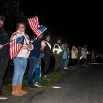 Photo by Sam Fletcher 
Members of the Oak Harbor community show support during the procession of Lt. Serena Dug Wileman on Monday.