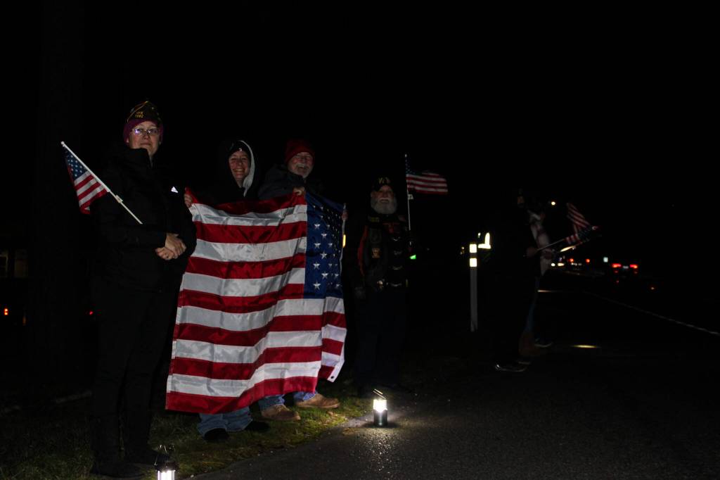 Members of the Veterans of Foreign Wars show support during the procession of Lt. Serena Dug Wileman on Monday. (Photo by Sam Fletcher)