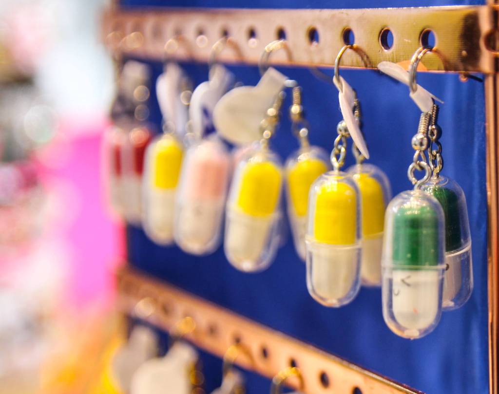 (Photo by Luisa Loi)
Pill earrings are some of the unusual earring charms that can be found at Roman-Rocks Jewelry.