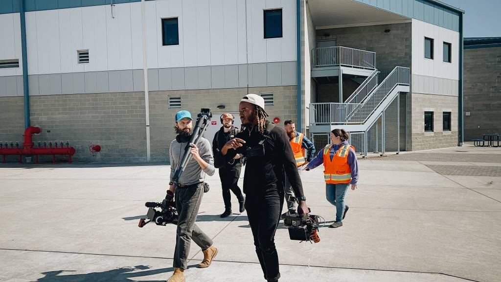 (Photo provided)
The Working on Whidbey crew walks on Navy Air Station Whidbey Island for a future episode.