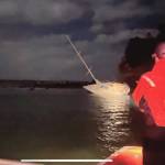 North Whidbey Fire and Rescue crew assist a grounded sailboat Thursday. (Photo provided)