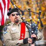Don Scoby, commander of Scottish American Military Society Pig War Post 1859, plays the bagpipe (Photo by Sam Fletcher)