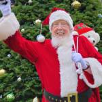 (Photo provided)
Santa Claus, also known as David Paull, waves cheerfully at the camera while shaking his reindeer bells.