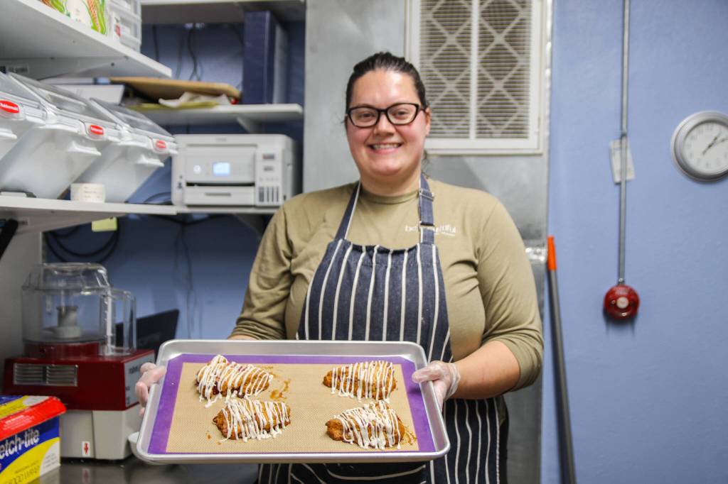 (Photo by Luisa Loi)
Vickie Berry embellished the strawberry rhubarb scones with a drizzle of vanilla bean glaze.