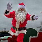Santa (Jon Gabelein) waves from atop his sleigh. (Photo by David Welton)