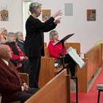 Cheryl Waide leads the bell ringers.