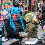 Photo by Luisa Loi
A child admires the work of a skilled face painter at the 2024 Penn Cove Musselfest.